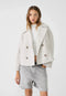 Manteau court pour femme avec double rangée de boutons et design intemporel